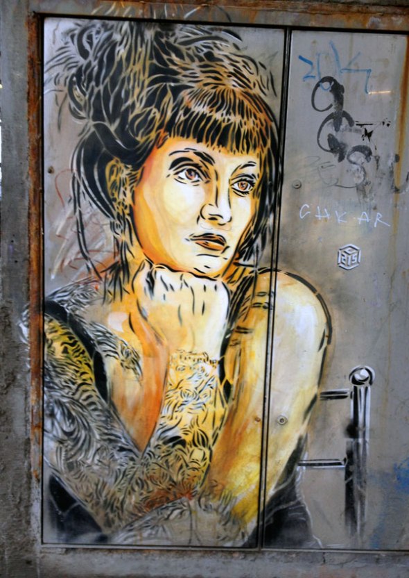 Tattooed woman  - street art